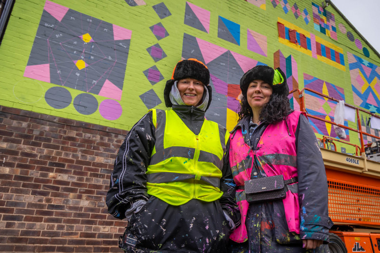 Professional artist, Cherie Grist, unveiling the new ‘RE-Making Crewe,' artwork on High Street (Peter Robinson).