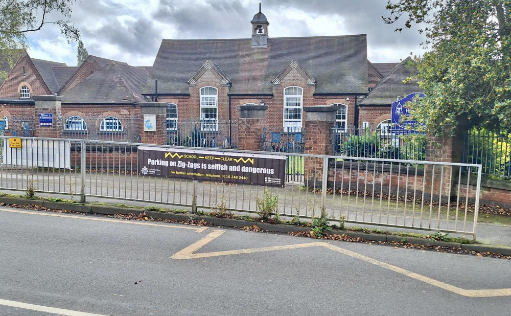 Signs warning parents about inconsiderate parking have been put up outside Hugglescote Primary School Credit: North West Leicestershire Police