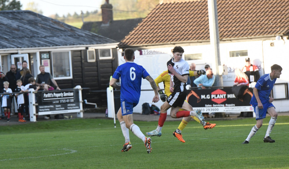 Charlie Bateson takes to the air for Shepton (Colin Andrews) 