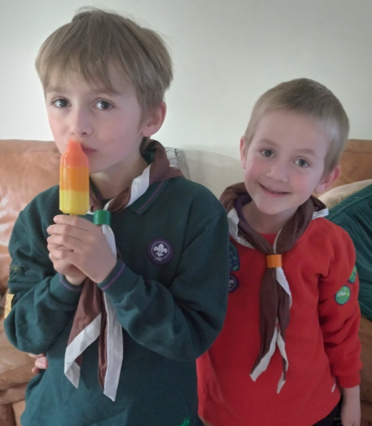 Leo and Ezra in their Scout uniforms