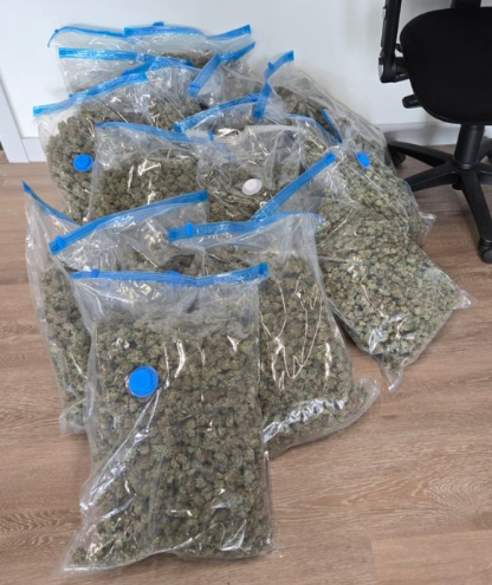 A number of large bags of cannabis, weighing around 20kg in total and worth in the region of £100,000, were recovered from the boot of the vehicle. (Photo: Staffordshire Police)