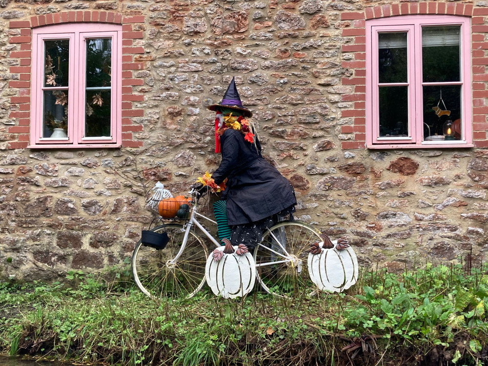 Residents of Wookey Hole get into the seasonal spirit with their witch scarecrow trail, featuring 25 handcrafted scarecrows scattered around the village (All photos supplied) 