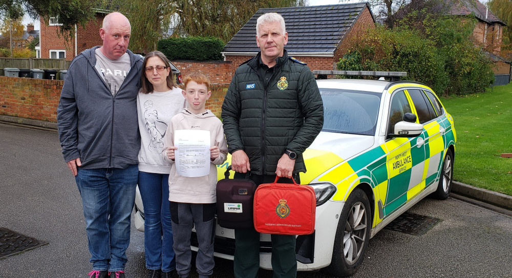 The family of a boy whose life was saved by the rapid response of a volunteer medic has urged ambulance chiefs to reverse their decision to stop him driving to emergencies on blue lights (LDRS).