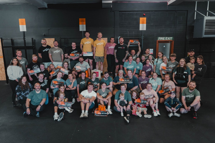 Members of CrossFit Mendip work out together, building fitness and community on the Maltings Trading Estate in Shepton Mallet.