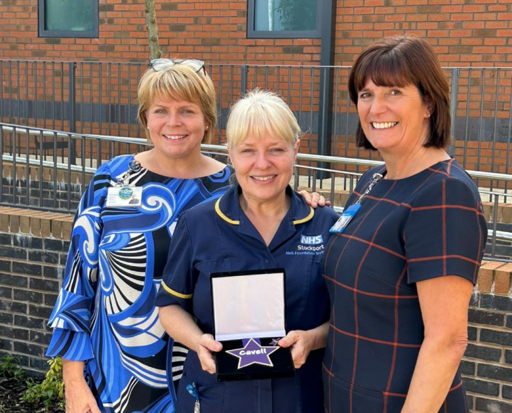 Carole Sparks with her award (centre), with chief nurse Nic Firth (left) and deputy chief nurse Helen Howard (right) (Image - Stockport NHSFT)