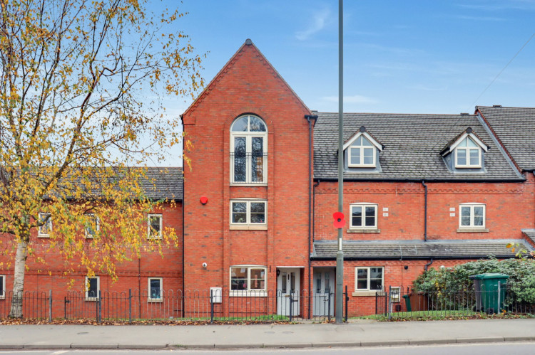 This is a fantastic, four-bed townhouse in Woodville. Photos: EweMove Ashby