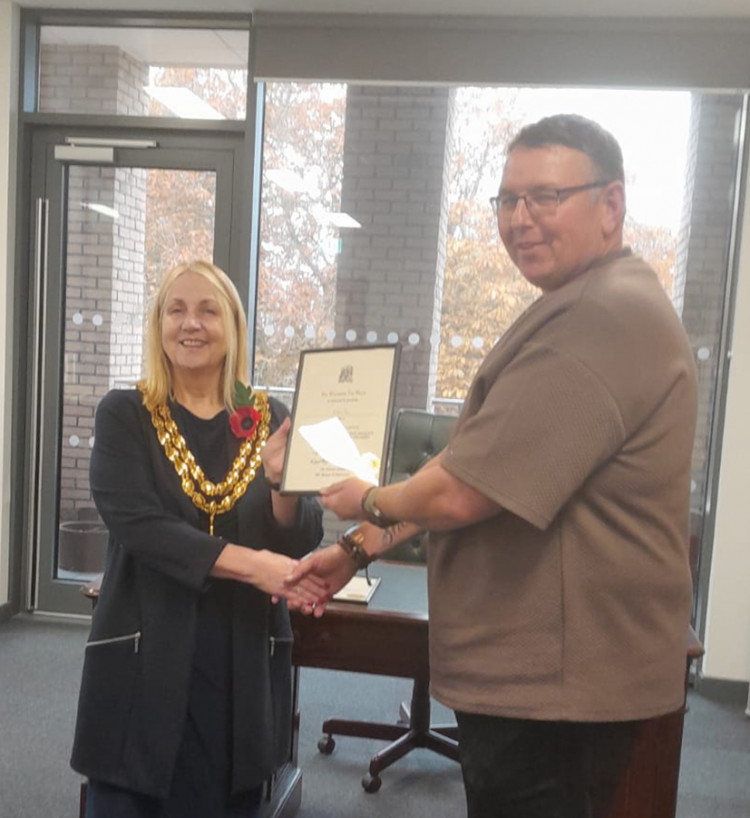 Rob received his award from mayor Cllr Kairen Raper. 