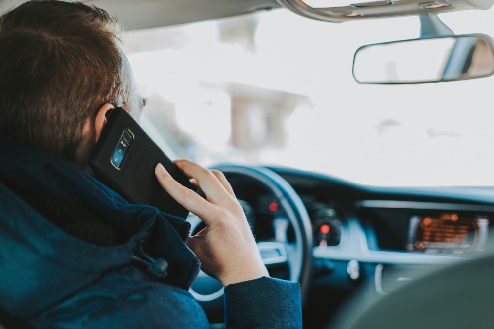 Kingston has been found in the top five Surrey postcodes for mobile use when driving (Credit: Alexandre Boucher/ Unsplash)