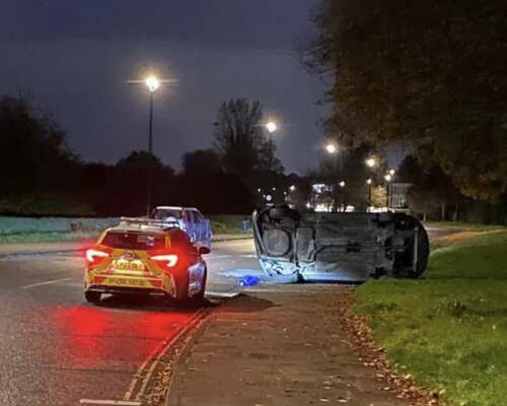 A car was found turned over on Riverside Drive in Ham on Sunday morning morning (Credit: Reuben Church/ Nextdoor)