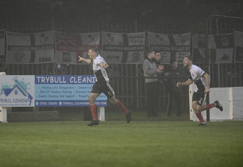 Shepton Mallet celebrate a crucial second goal as they secure a 2-0 victory over Torpoint in front of home fans. (Photo: Colin Andrews) 