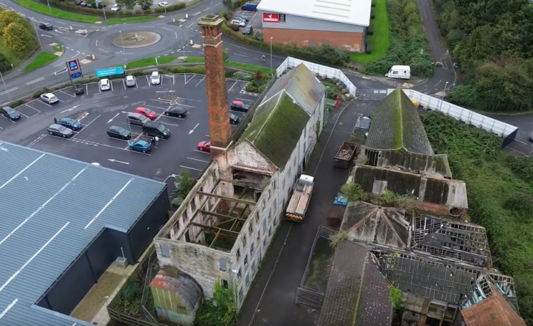 Aerial footabe of the Baily's buildings in Glastonbury (Youtube/JustMadnessBoy) 