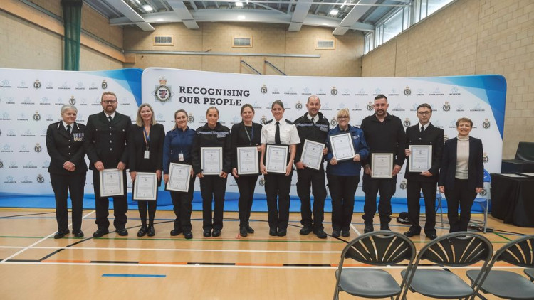 The Glastonbury Neighbourhood Policing Team celebrates winning the Angela Yeoman Award for their outstanding work in reducing crime and improving community safety.