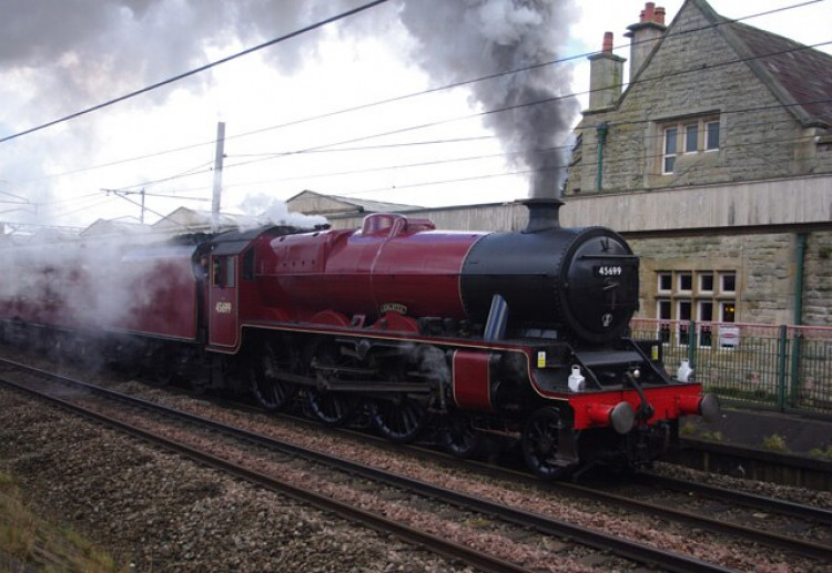 The trip, set to take place on 8 March, will involve stops at Manchester, Stockport, Macclesfield, and Stratford-upon-Avon. It will feature a locomotive from the Carnforth Steam Pool (Image - Wikimedia Commons / Ian Taylor)