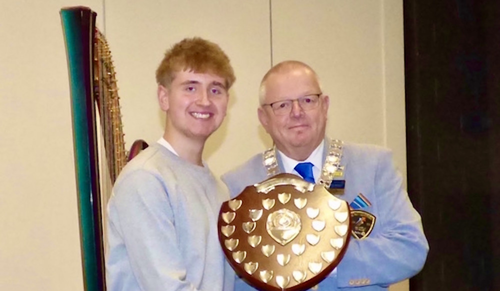 Ashby Rotary Young Musician 2025 Euan Lukjanenko receives the trophy from District Governor Chris Knight. Photos: Supplied