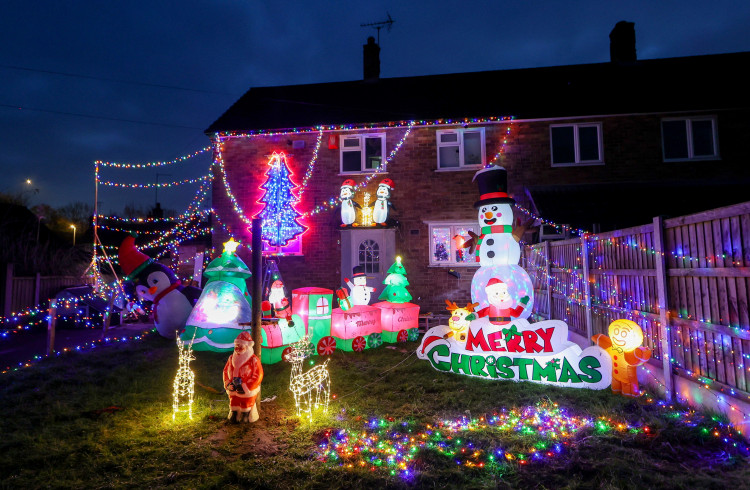 The Stonier's Christmas display features around 7,000 lights and numerous inflatables (SWNS).