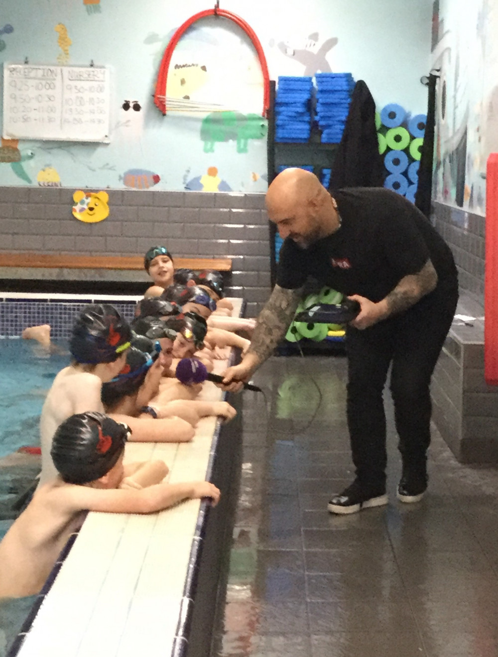 PJ Ellis, BBC Midlands Today interviewing our Year 6 swim squad.