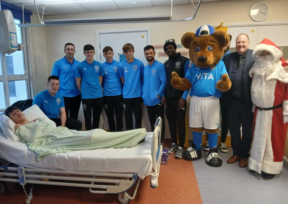 Young patients at Stepping Hill Hospital's Treehouse unit were treated to a surprise visit from Stockport County players and staff (and Santa himself!) (Image - Stockport NHSFT)