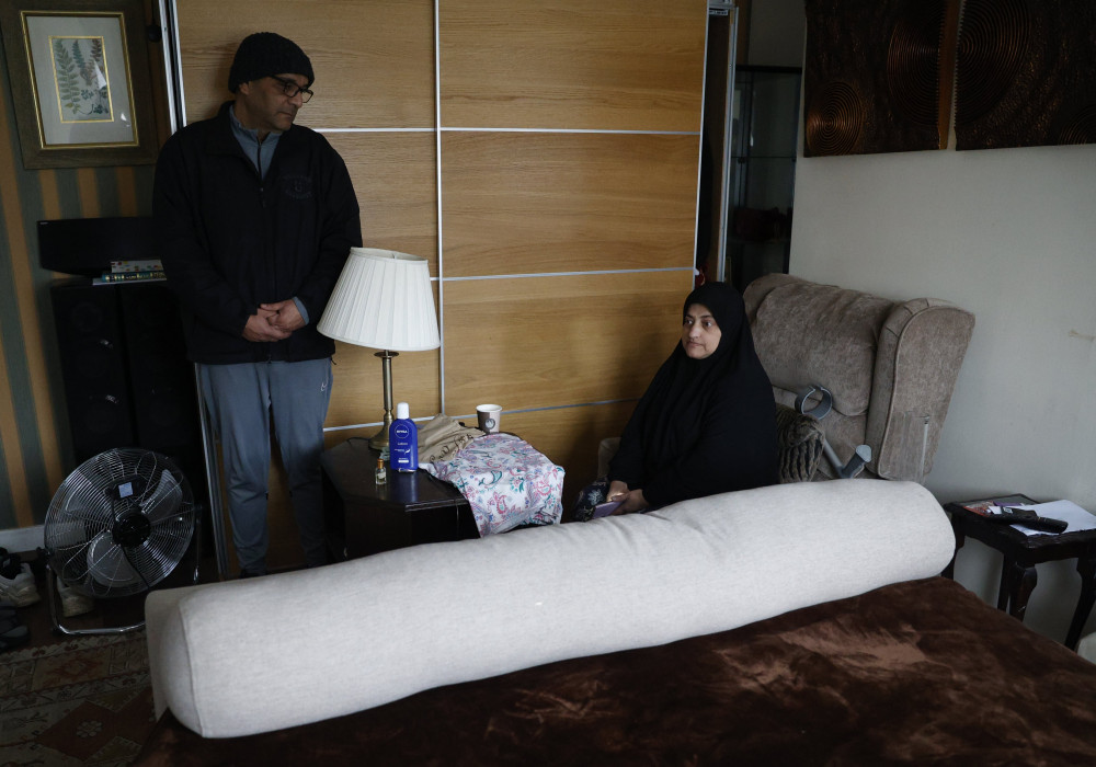 Imran and Afsheen Durrani in their home in Syon Lane, west London (credit: Facundo Arrizabalaga/MyLondon).