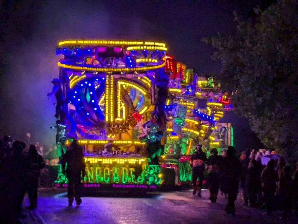 Community spirit and dazzling floats combine to raise an impressive total for charities and projects in Glastonbury.