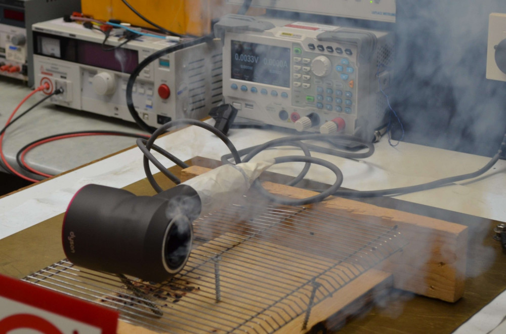 Counterfeit Dyson ‘Supersonic’ hairdryers emitting smoke during testing and the melted appliance casing afterwards.