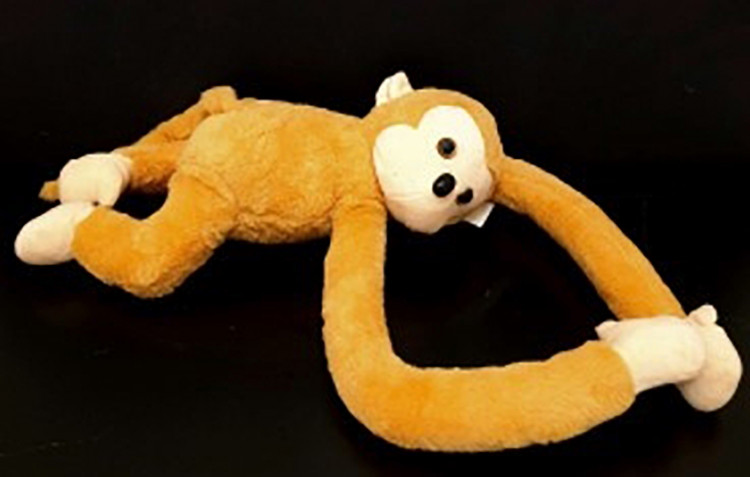 Monkey toys where the nose and eyes detached posing a choking hazard.