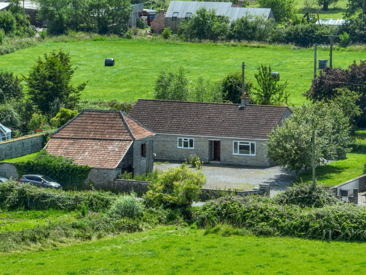 Idyllic countryside living: enjoy stunning views of Glastonbury Tor from this charming Lower Godney bungalow