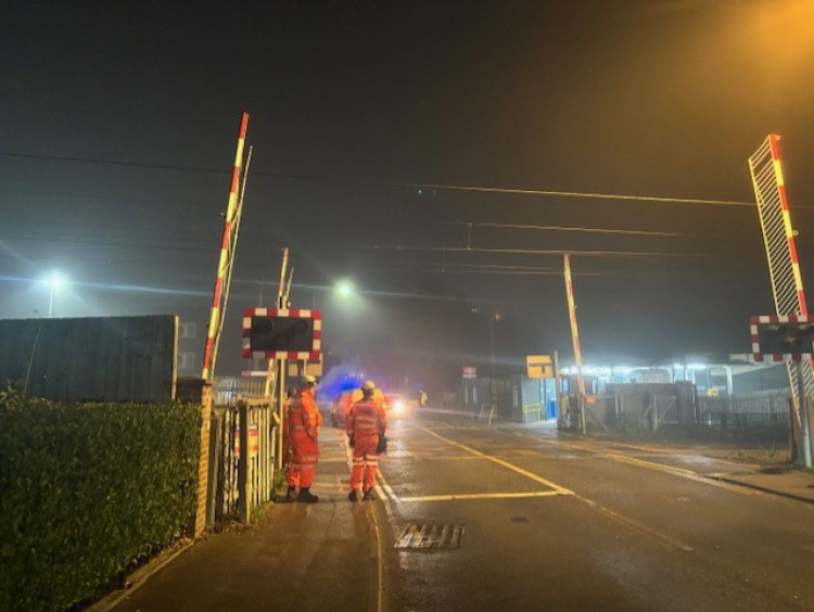 Network Rail engineers managing the cossing after completing partial repairs.