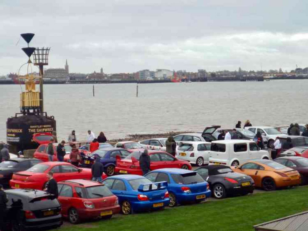 Japanese car-owners showed off at Shotley marina with Harwich as a backdrop