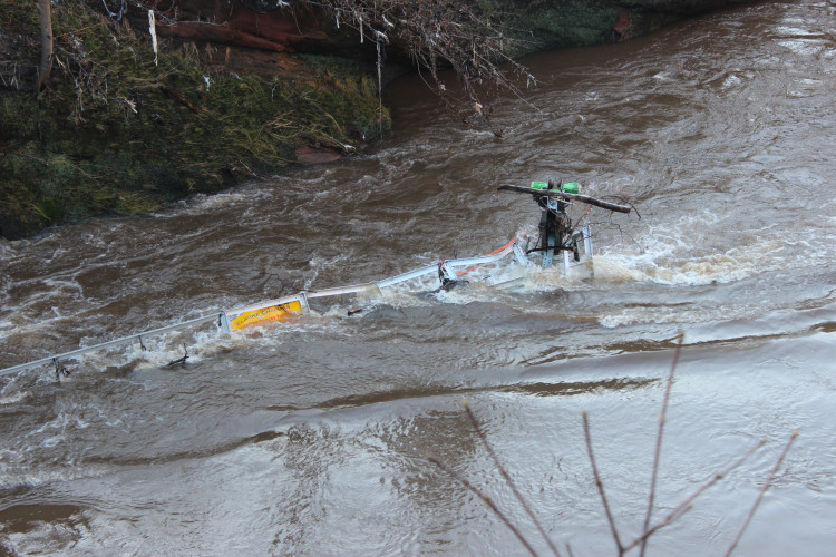 Debris seen in the high-flowing River Mersey in Stockport following heavy rain and floods (Image - Alasdair Perry)