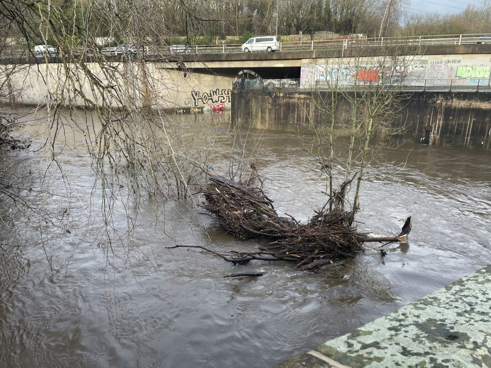 The River Mersey seen flowing high at the confluence of the Rivers Goyt and Tame (Image - Alasdair Perry)