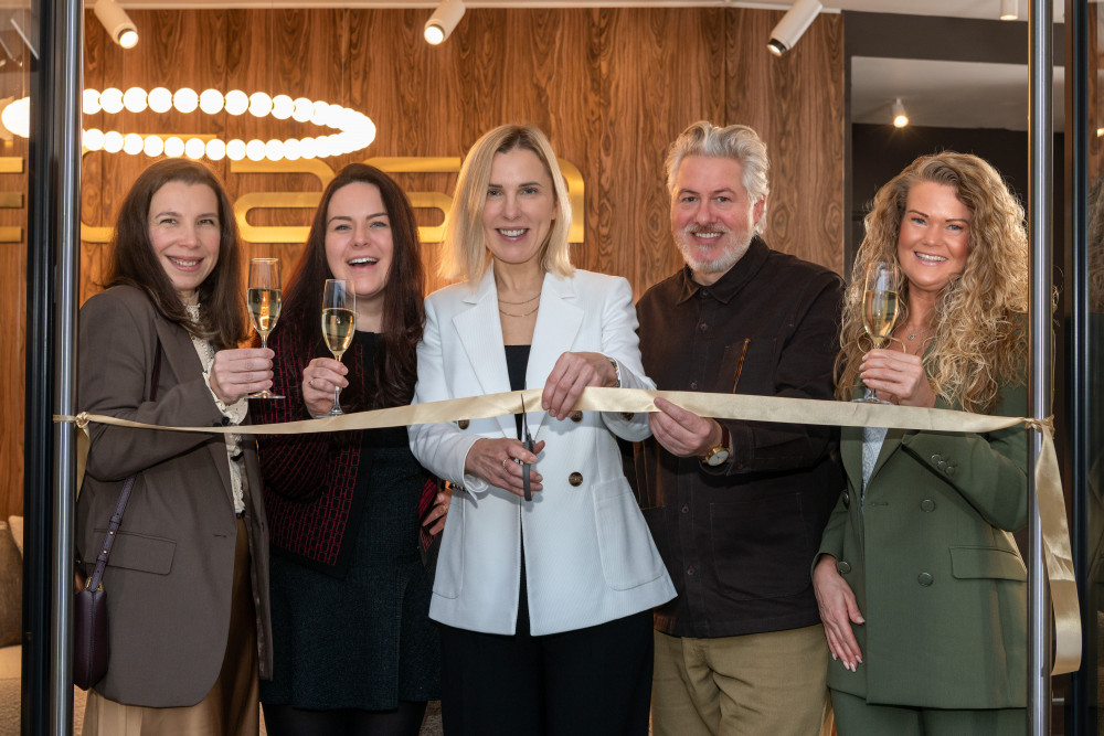 Dzintra Suste (centre) cutting the ribbon to mark BelCasa's formal opening (Image supplied)