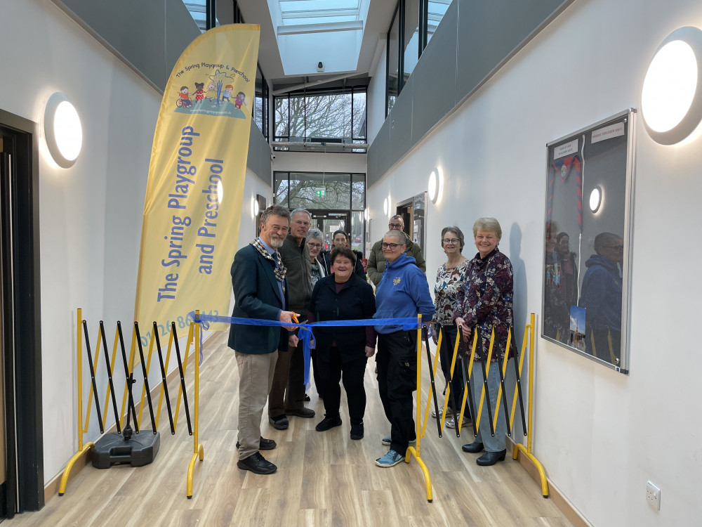 The Mayor cuts the ribbon at the new Spring Playgroup premises (image supplied)