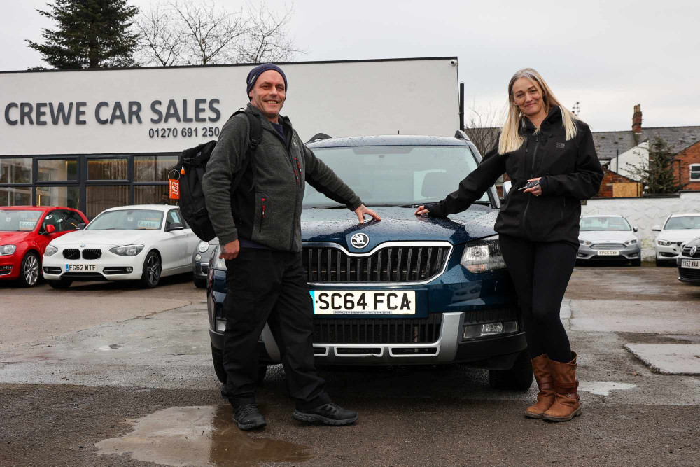 Kristina, 43, and her husband Dan Coulson, 50, picking up the Skoda Yaris at Crewe Car Sales, Badger Avenue (SWNS).