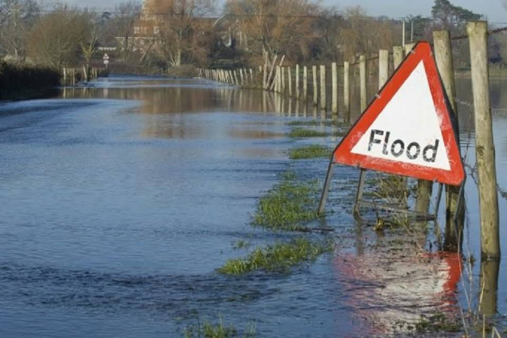 The Environment Agency has issued red and yellow flood warnings across Somerset.