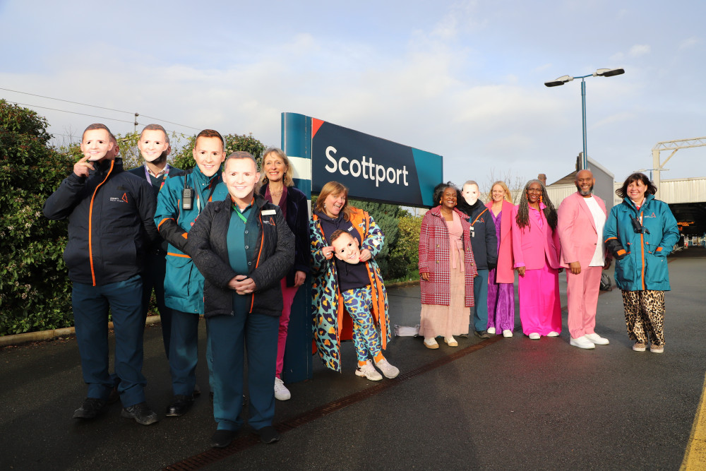 From left to right: Avanti West Coast team (in Scott Mills masks), The Reverend Kate Bottley, Members of ‘The Sing Out Choir’ and Avanti West Coast Station Manager, Lisa Magee (Image - Avanti West Coast)