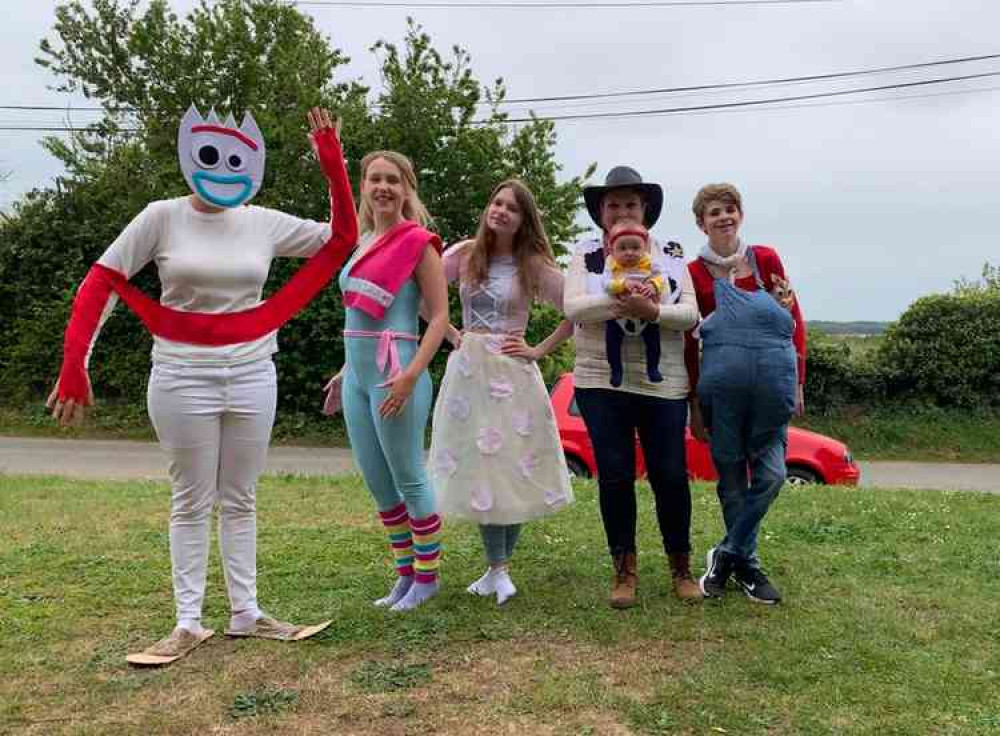 Caroline Outhwaite and children as Forky, Woody, Stinky Pete, Bo Peep and Barbie.