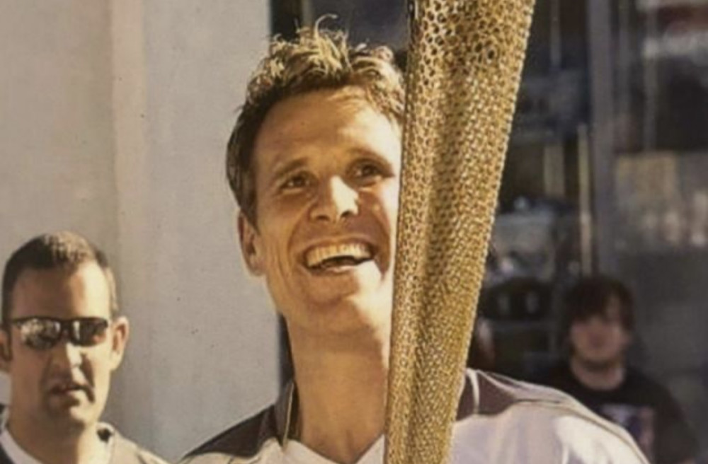 Rower James Cracknell carried the torch through Kingston Upon Thames ahead of the 2012 London Olympics (Credit: Mallams)