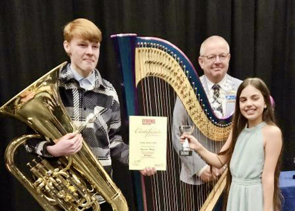 Young Musician District Final winners Sam Pope and Effie Bowman accompanied by District Governor Chris Knight. Photo: Supplied