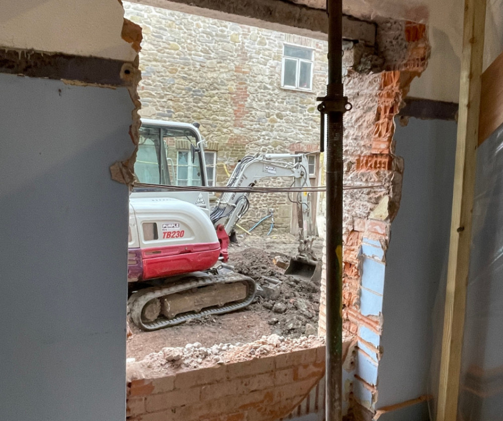 Glastonbury's St Dunstan’s House renovation progresses with the discovery of an original architectural feature, and upgrades to energy infrastructure underway.