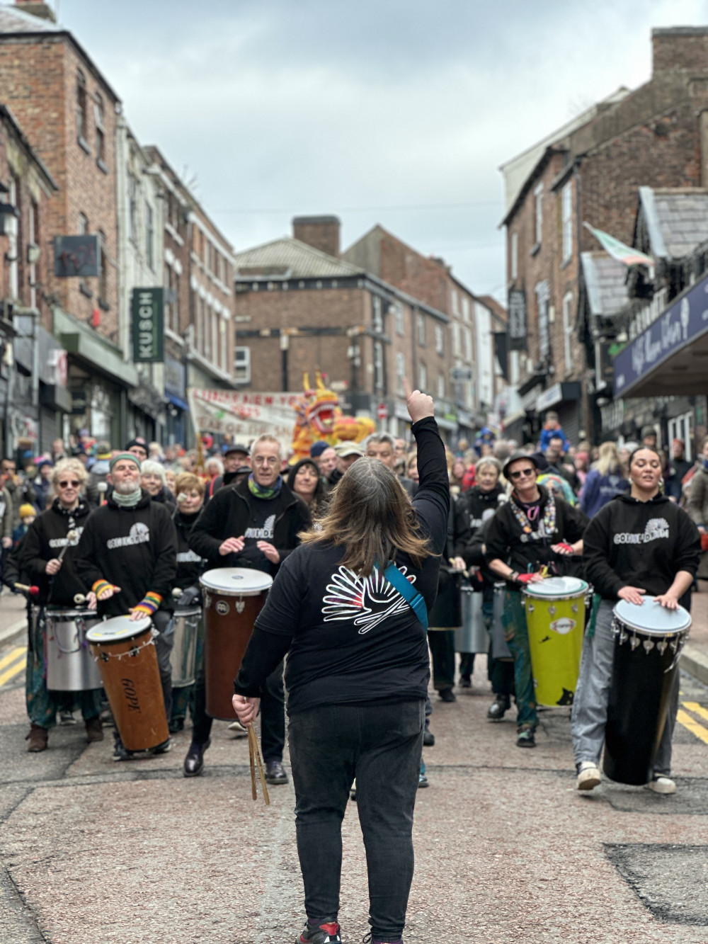 The parade makes its way down Mill Street (Credit: MTC)