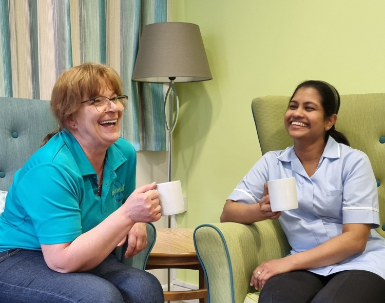 L-R Colleagues Liana Jianu and Aji Paul enjoying the new staff room