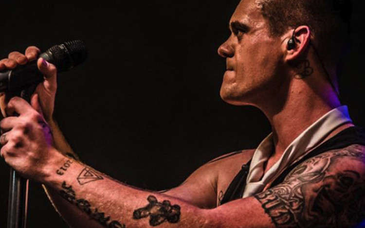 Dan Budd will be performing a tribute to Robbie Williams in Wells this weekend.