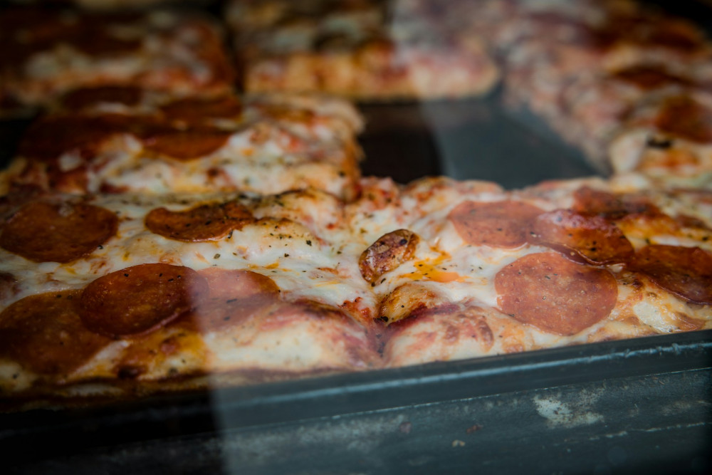 DoughClub is launching its second location in Cheadle Hulme this February, offering Detroit-style pizza (Image - Jason Leung / Unsplash)