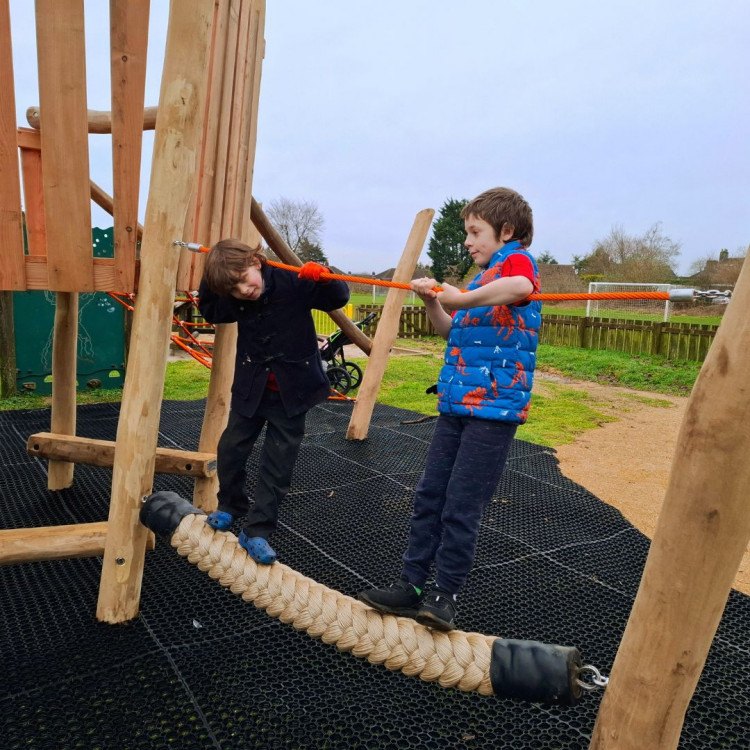 Gilbert and Joseph enjoy the new play tower