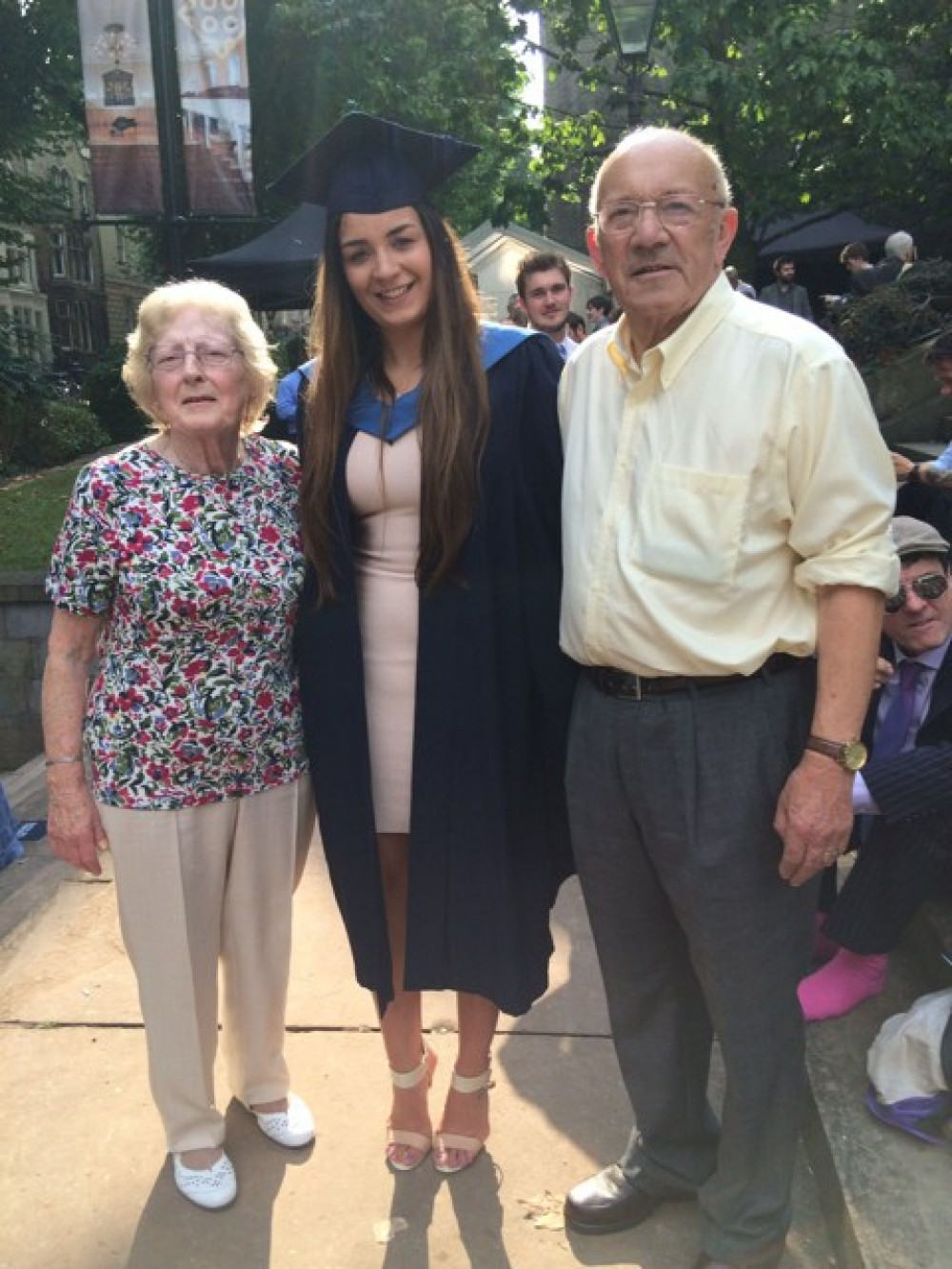 Jess with her grandparents at her graduation in 2016