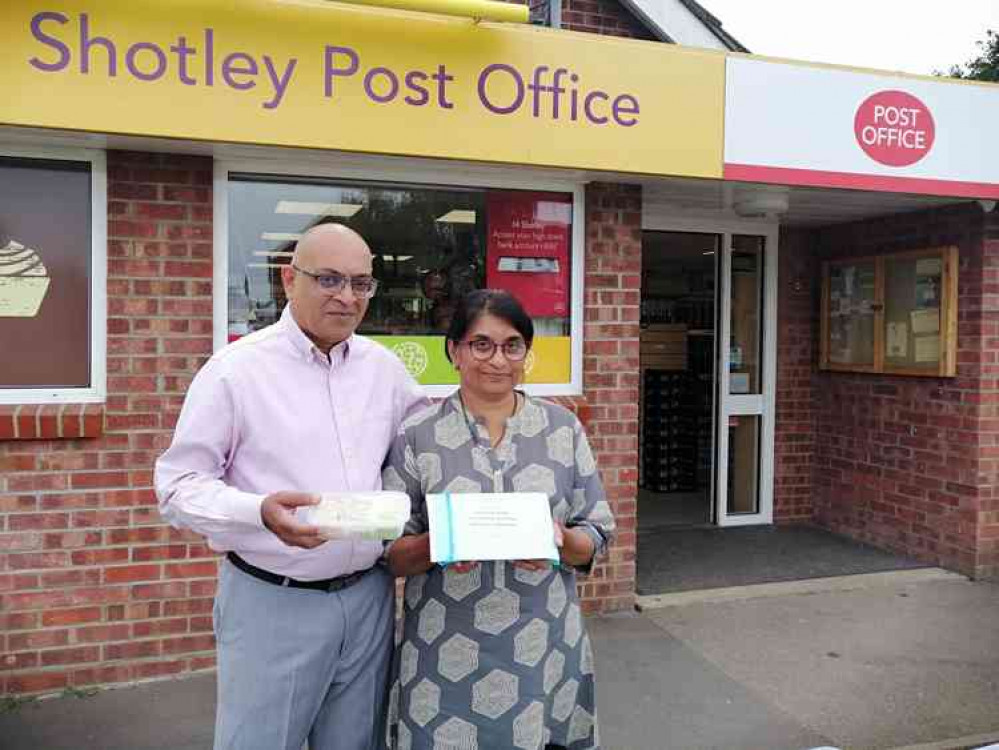 Manish and Trupti Patel outside Shotley Post Office