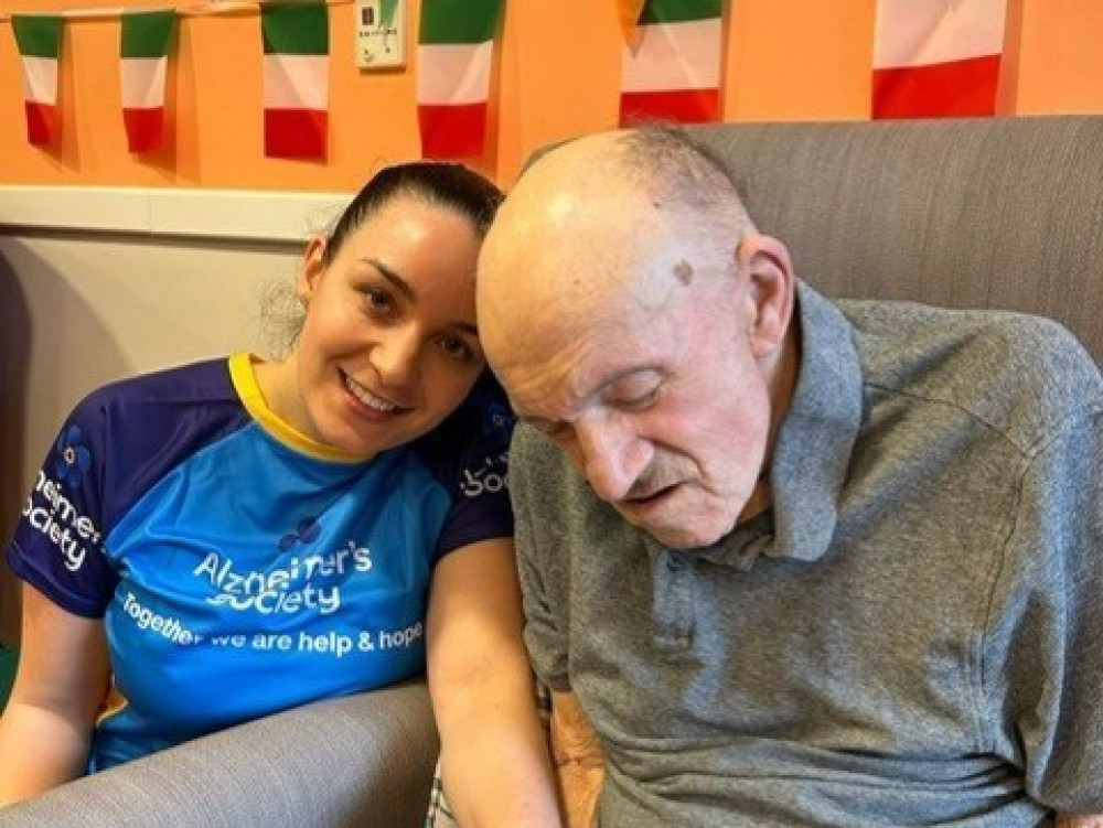Jess in her half marathon t-shirt with grandad Brian. Jess in her half marathon t-shirt with grandad Brian.