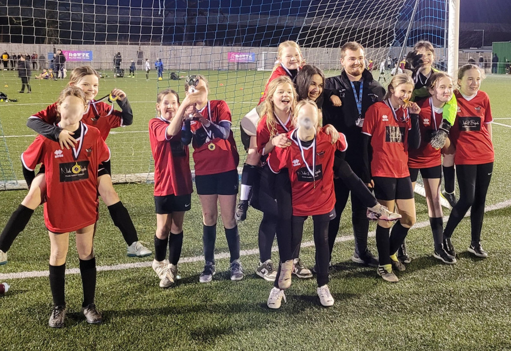 Balsall Common Primary School’s girls football team and coaches.