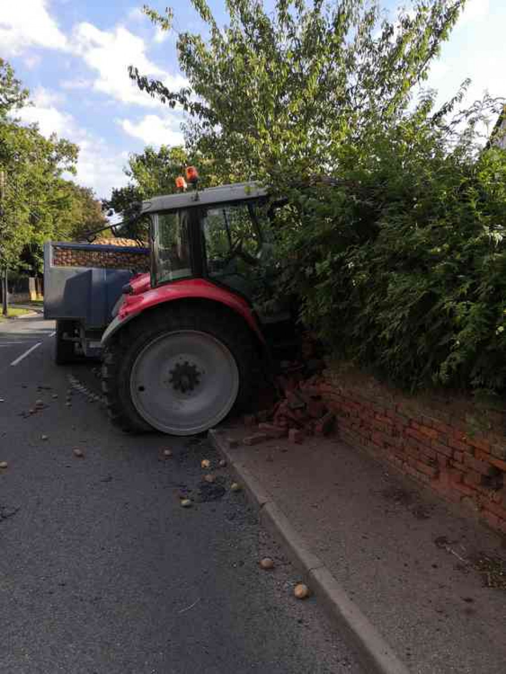 Potatoes spilled as tractor hits wall. (Picture credit: Chris Hodgkinson)