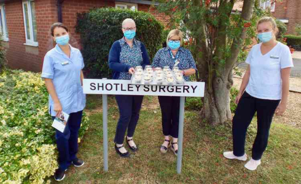 Spring Lodge carers Vanessa and Emily with Kate and Carolyn (middle two) Shotley surgery staff members